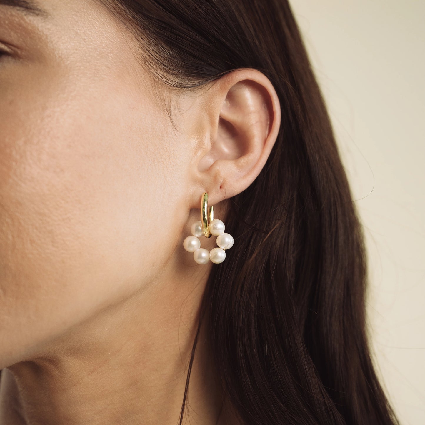GOLD PLATED HUGGIE EARRINGS WITH CIRCLE GEMSTONE CHARM