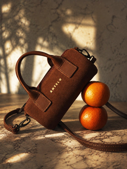 Indo leather mini barrel crossbody